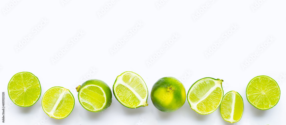 Fresh limes on white background.