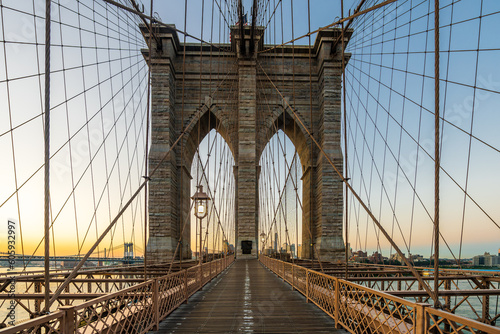 The Brooklyn bridge and lighting lamps early in the morning dawn. © Ondrej Bucek