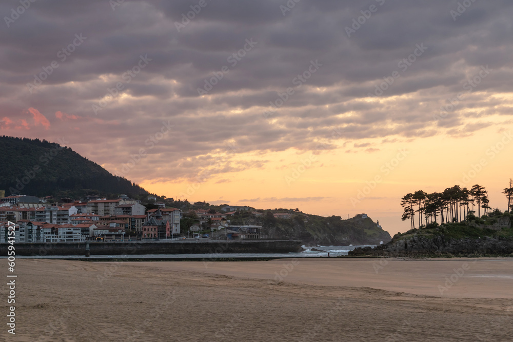 Lekeitio at sunset. Karraspio Beach, San Nicolas Island, Bizkaia, Basque Country