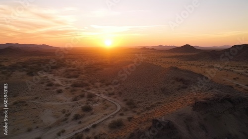 Experience the awe-inspiring spectacle of a desert sunset captured by breathtaking drone footage. As the sun sinks below the horizon. Generated by AI.