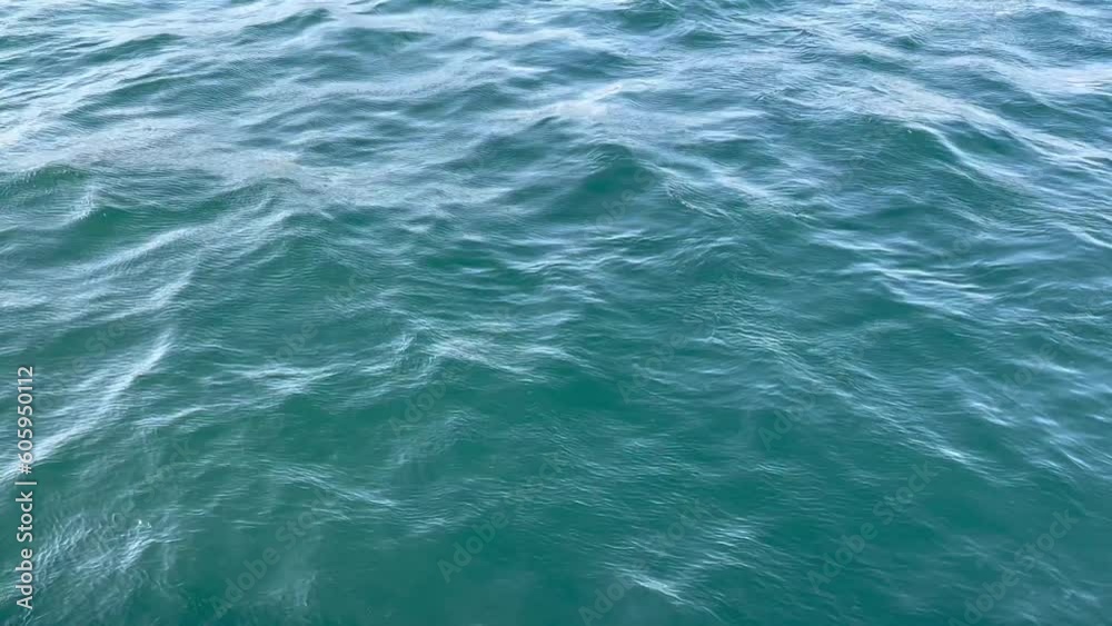 small waves of blue water, the camera is static. small waves of blue water, the camera is static.