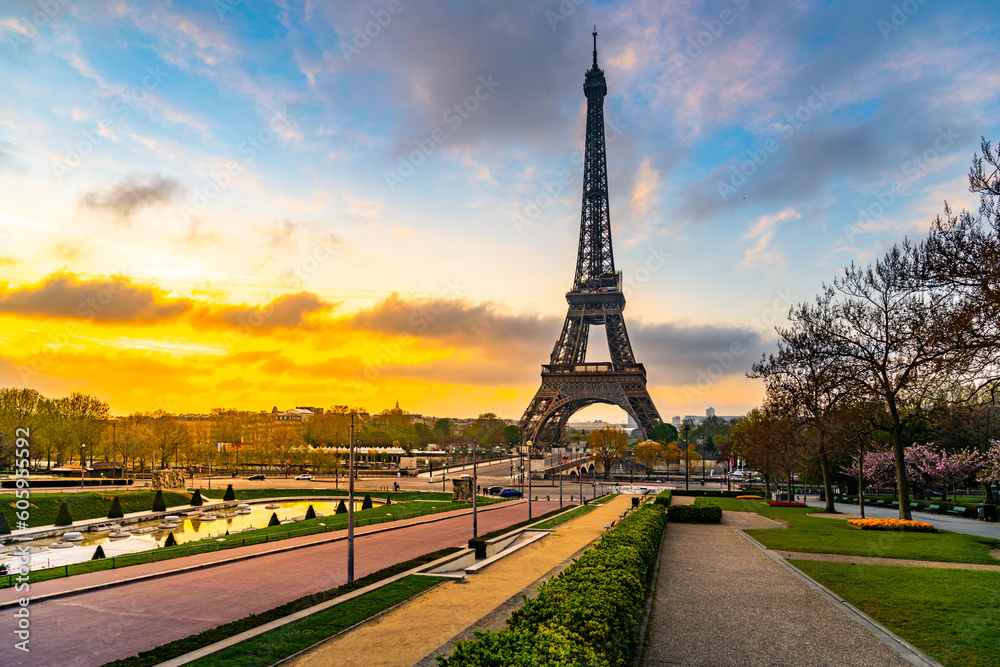 Sunrise behind the Eiffel Tower. Spring morning in Paris, France Sunrise behind the Eiffel Tower. Spring morning in Paris, France