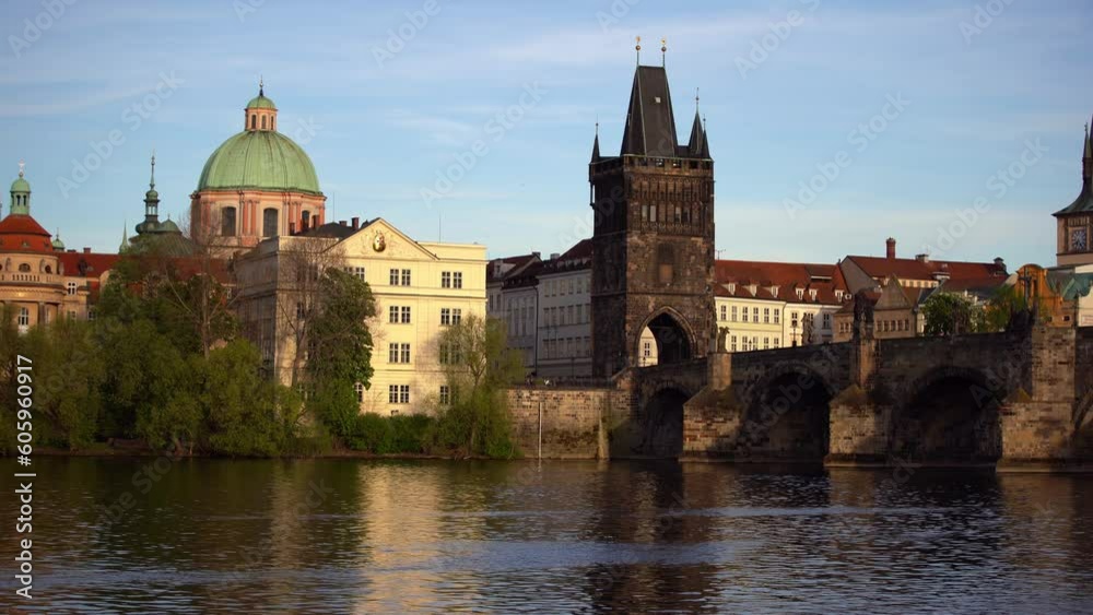 View of the Vltava River and Charles Bridge on a sunny day in the center of Prague in summe View of the Vltava River and Charles Bridge on a sunny day in the center of Prague in summe
