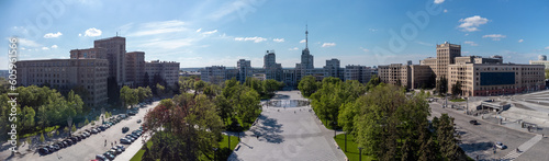 Aerial panorama view on Derzhprom, Karazin university buildings and Freedom Square with blue sky in spring Kharkiv city center, Ukraine