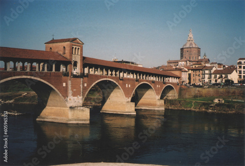 View of Ancient Ponte Coperto Bridge on Ticino River. Pavia, Italy. Film Photography