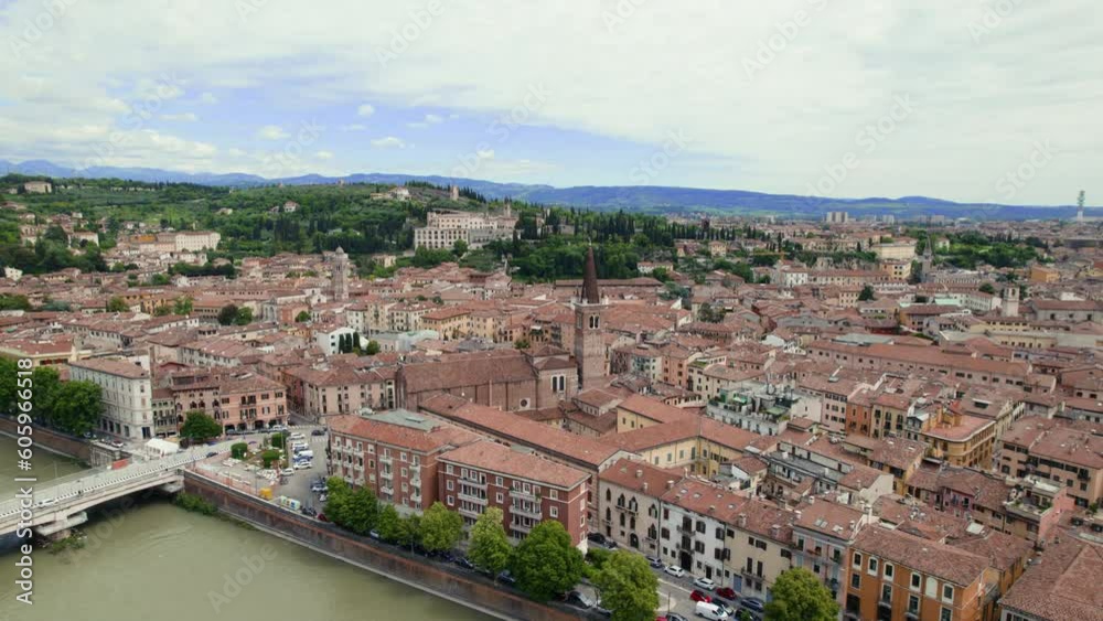 Verona, an amazing City in Italy, from a drone, orbiting around the major churches. sunny day in summer overlooking hills nearby Verona, an amazing City in Italy, from a drone, orbiting around the major churches. sunny day in summer overlooking hills nearby