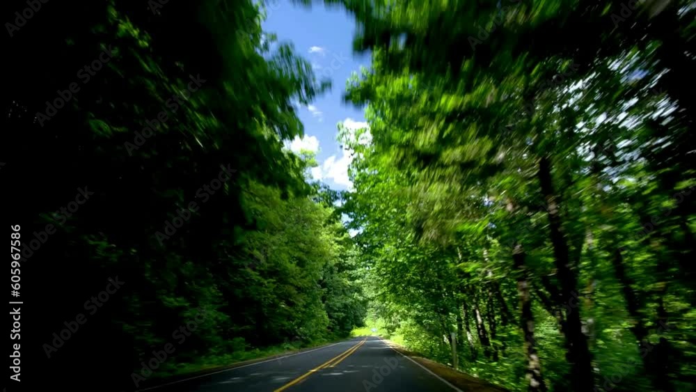 Solitude in the Desert: Solo Driving on Dark Black Road, Amidst Red Rocks and Majestic Mountains Solitude in the Desert: Solo Driving on Dark Black Road, Amidst Red Rocks and Majestic Mountains