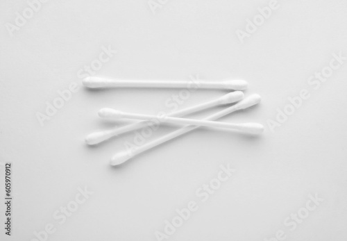 Clean cotton buds isolated on white, top view