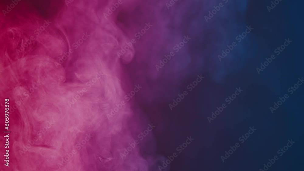 Fluffy clouds of smoke in blue pink neon light on a black background. Mockup for your logo, wallpaper or web banner. Slow motion.
