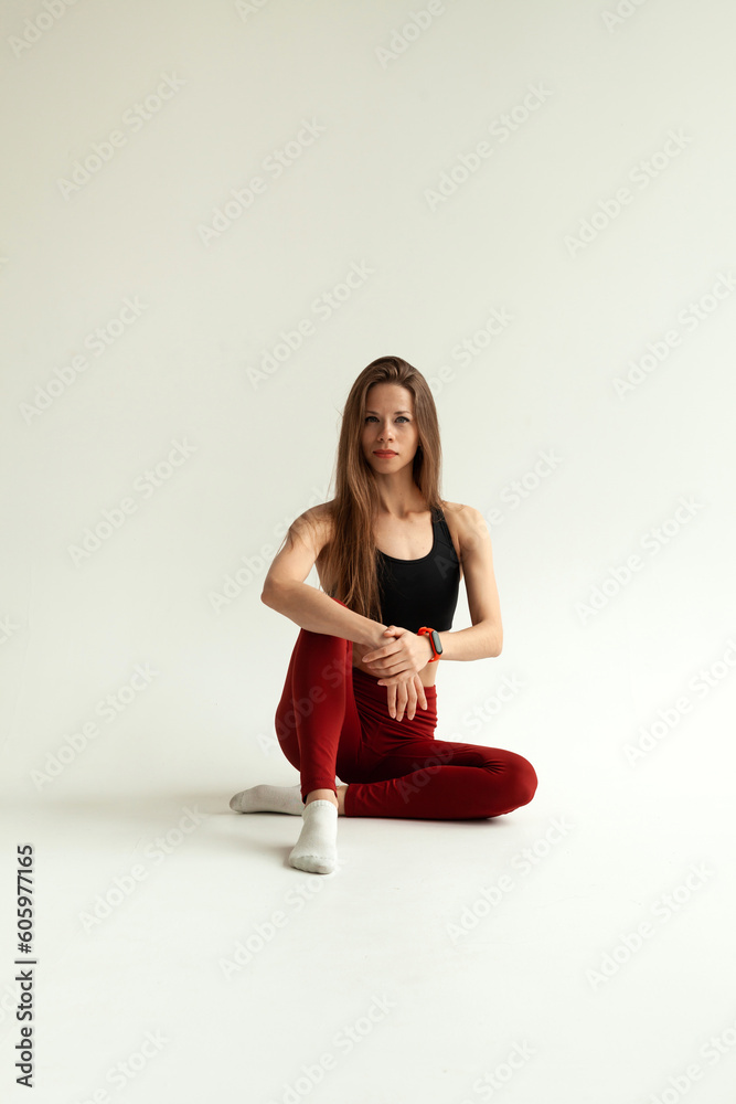 Obraz premium fitness and yoga girl on a white background