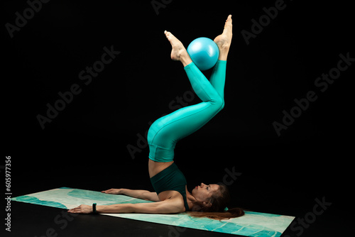 fitness and yoga girl on a black background