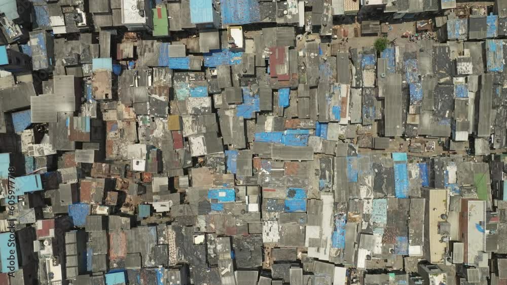 Drone flyover on of the largest slum in the world, topdown view of Dharavi slum complex. Mumbai Drone flyover on of the largest slum in the world, topdown view of Dharavi slum complex. Mumbai
