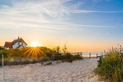 Sunrise at Heiligenhafen on the beach in the baltic sea photo