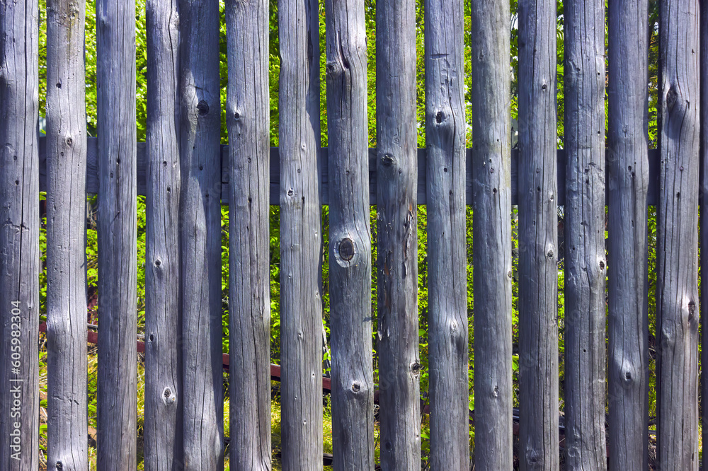Fence made vertical wooden planks, wood texture surface, vintage background.
