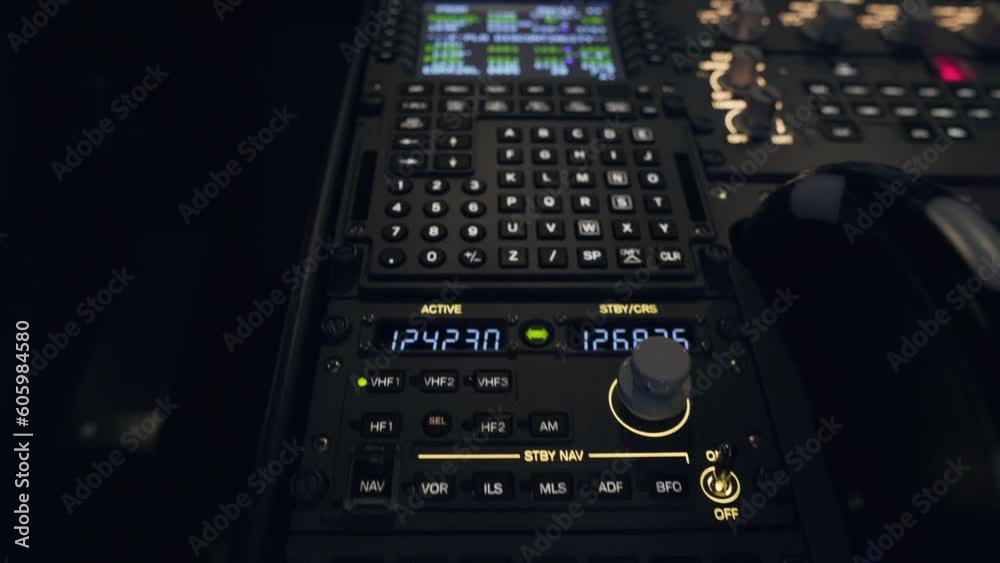 Dashboard panel inside plane for a flight simulator with illuminated buttons Dashboard panel inside plane for a flight simulator with illuminated buttons