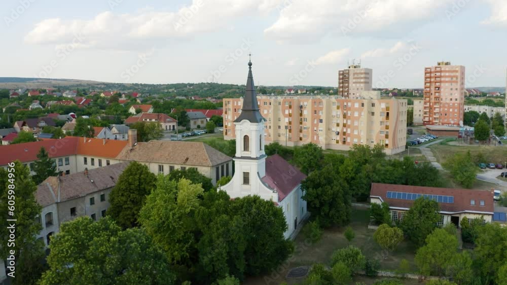 Aerial video of the church surrounded by residential buildings, Hungary Aerial video of the church surrounded by residential buildings, Hungary