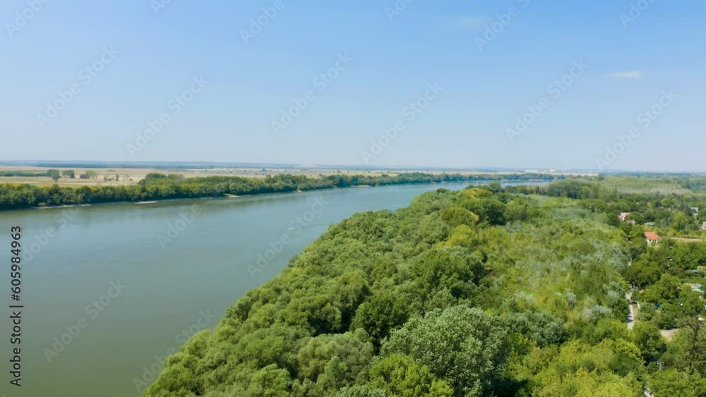 Aerial video of Danube river with trees in the forest on the shore Aerial video of Danube river with trees in the forest on the shore