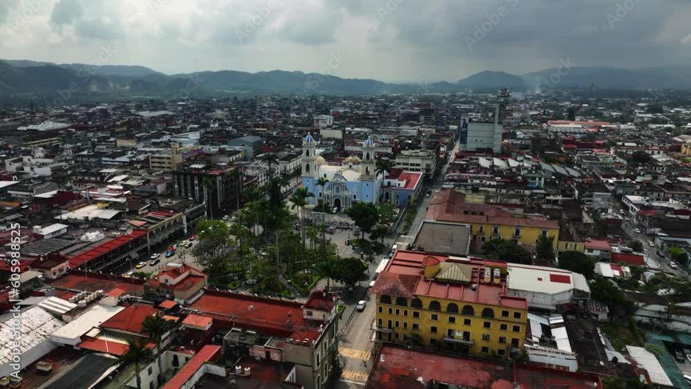 Drone shot circling the Immaculate Conception Cathedral, in cloudy Cordoba, Veracruz, Mexico