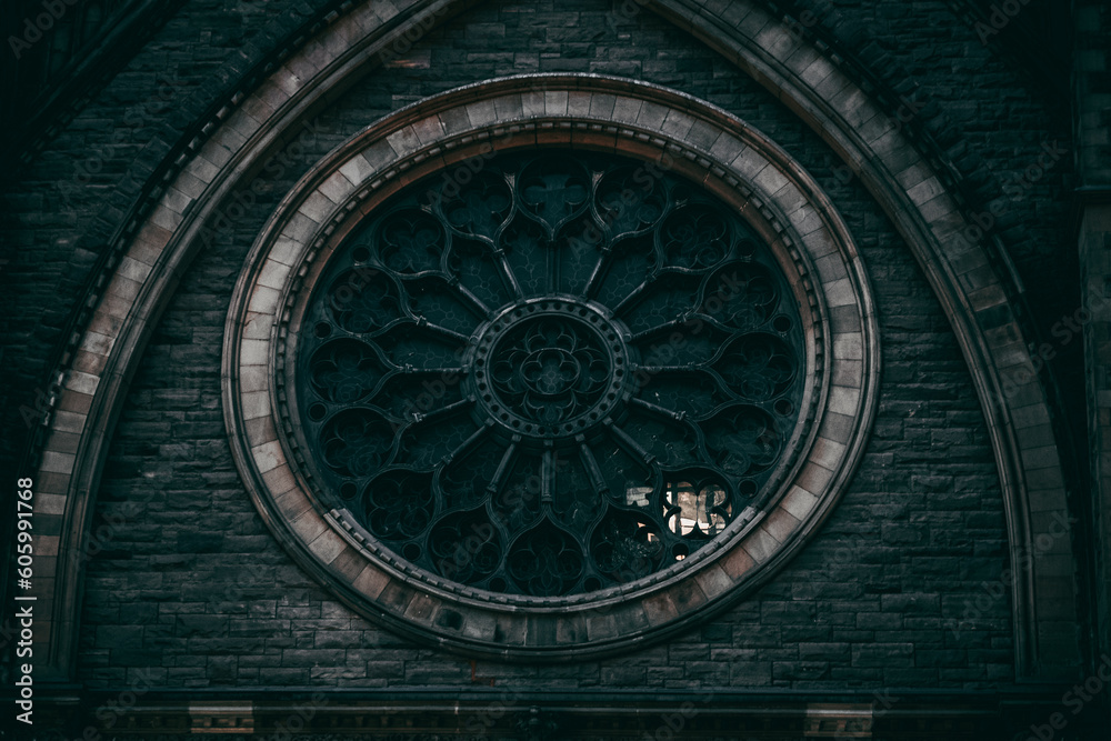 Closeup of an old beautiful rose window of a church in Montreal, Ontario, Canada