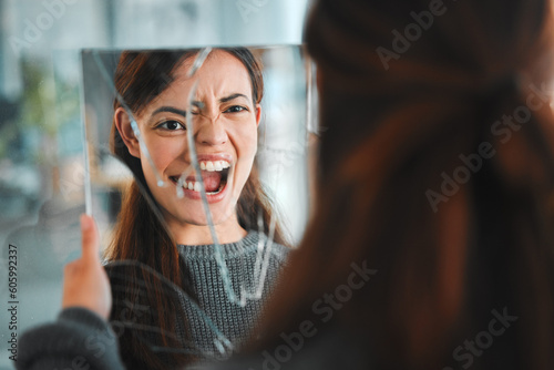 Mirror, broken and mental health with reflection of woman for bipolar, split identity and anxiety. Stress, psychology and ego with female person at home for fear, danger and schizophrenia crisis photo