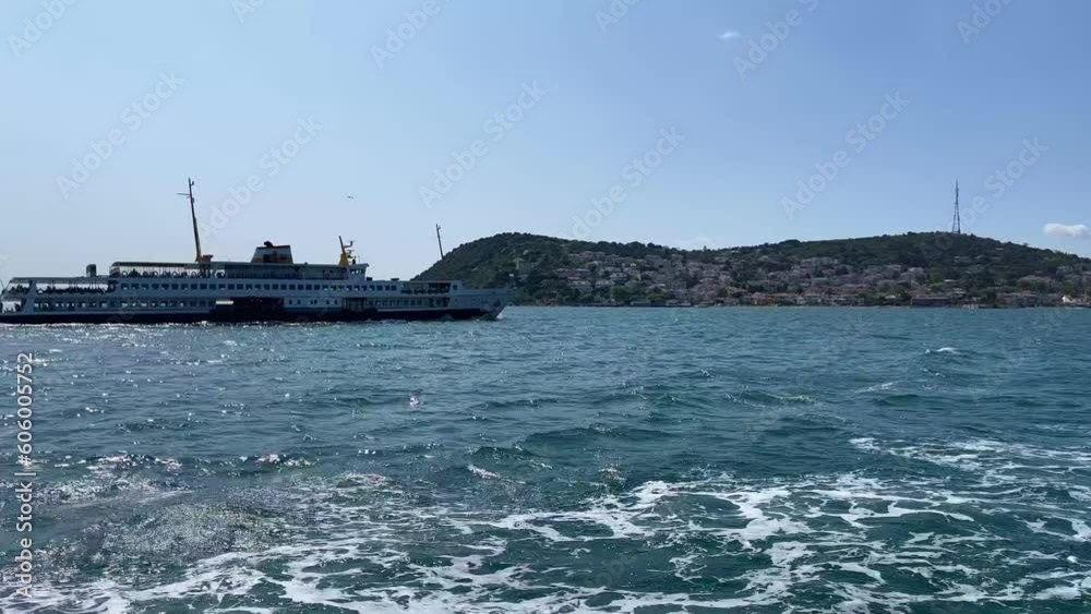 the steamer sails past the mood in the blue sea. the steamer sails past the mood in the blue sea.