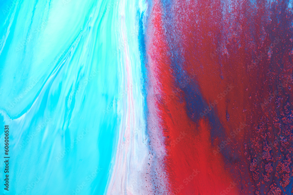 Multicolored creative abstract background. Red blue alcohol ink. Explosion, stains, blots and strokes of paint, marble texture