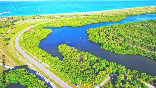 Drone view over the waters and greenery of Fort De Soto Park before the blue skyline photo