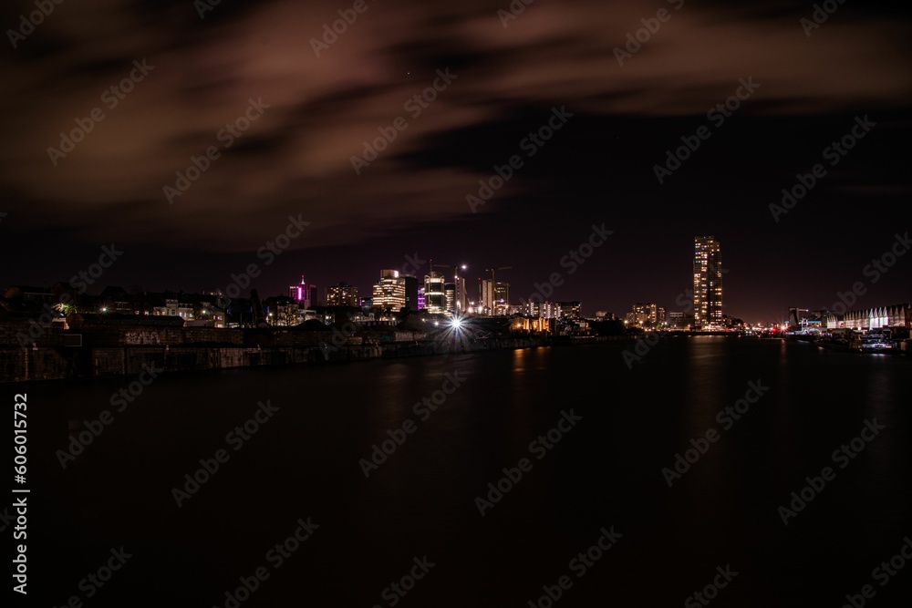 Scenic view of a coastal city skyline during nightime