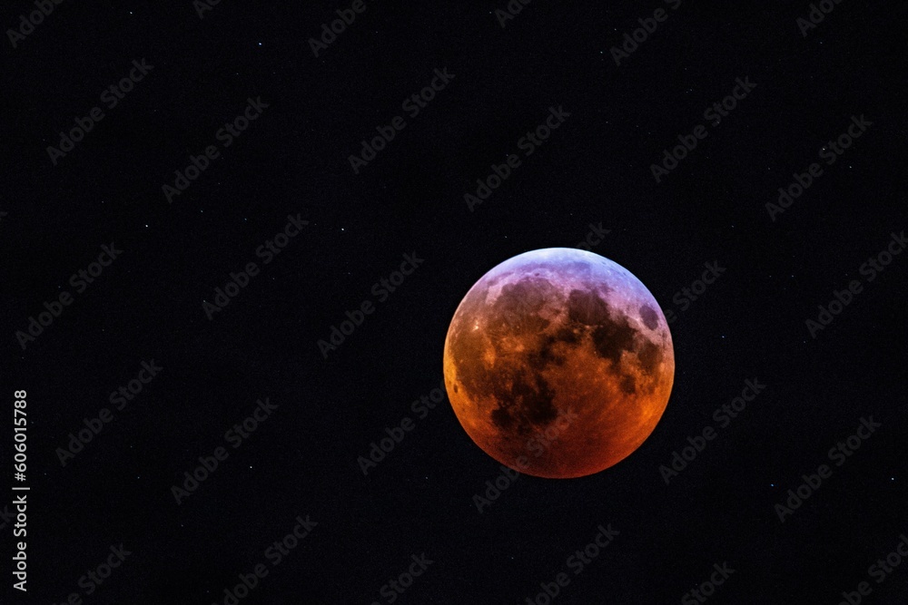 the blood moon is seen during a lunar eclipse in this photograph