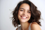 Portrait of Young Brunette Woman Smiling Cheerfully and white background