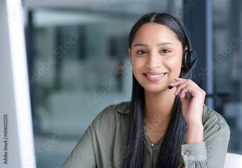 Happy, call center and portrait of a woman with a headset for online consulting, support or telemarketing. Smile, contact us and a customer care worker in an office for service, advice and help