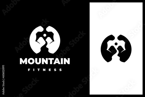a combination of mountain, river, mountain, and muscles. mountain fitness or gym logo design