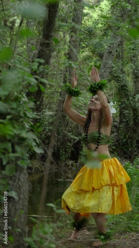 Wallpaper Mural Hula dancer performing art and culture of hawaii in the middle of the jungle connecting with nature in a personal wellness ritual. Hawaiian dance danced in the forest Hula dance. Torontodigital.ca