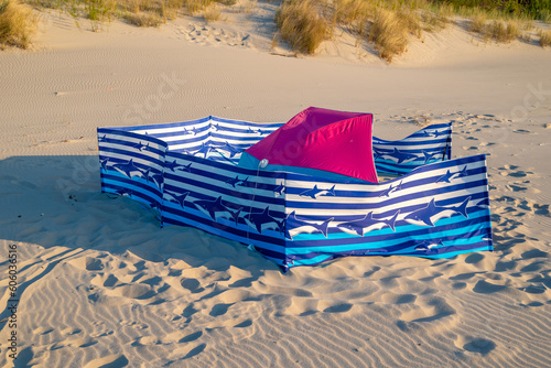 Fototapeta Naklejka Na Ścianę i Meble -  Leisure on the beach, windbreak on the beach