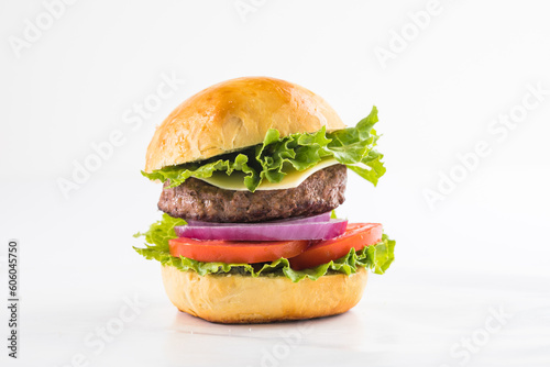 Delicious juicy grilled burger on wheat buns. Studio macro shot.Food Feast Party.