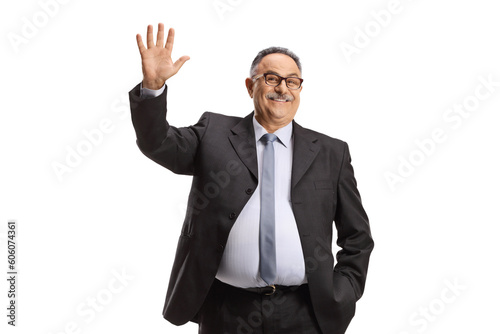 Portrait of a mature businessman waving hello photo