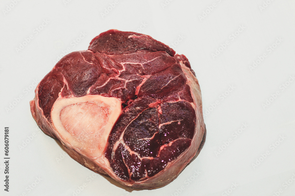 Obraz premium Fresh piece of meat big beef steak on the bone ossobuco.