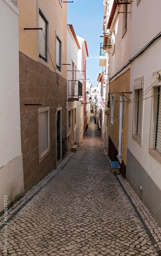 Typical street in the fishing village of Nazaré, Portugal