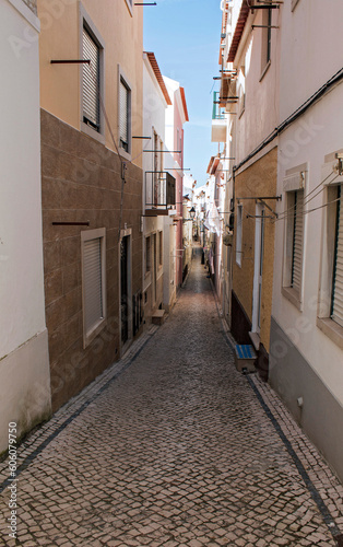 Typical street in the fishing village of Nazaré, Portugal