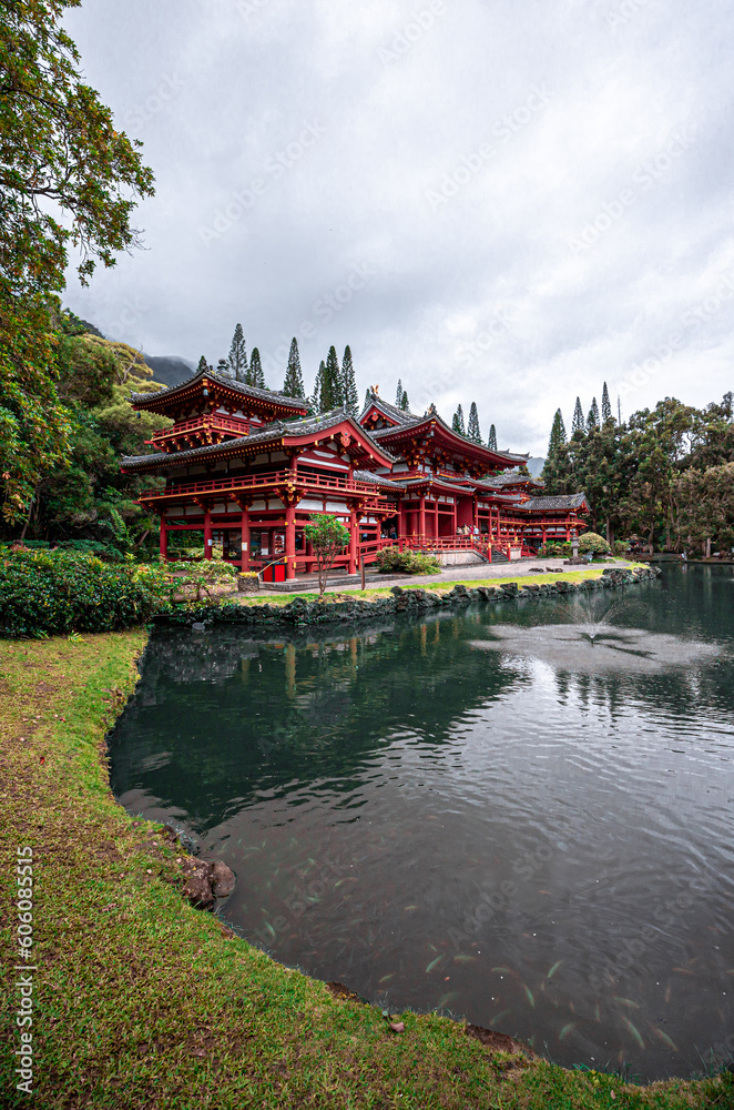 Red temple with pond