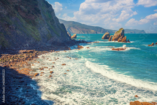 Rocky seashore near the island of Gaztelugatxe. Bay of Biscay, Basque Country Spain, Europe photo