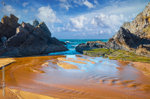 Rocky seashore on a sunny day. Ibarrangelu, Bizkaia, photo
