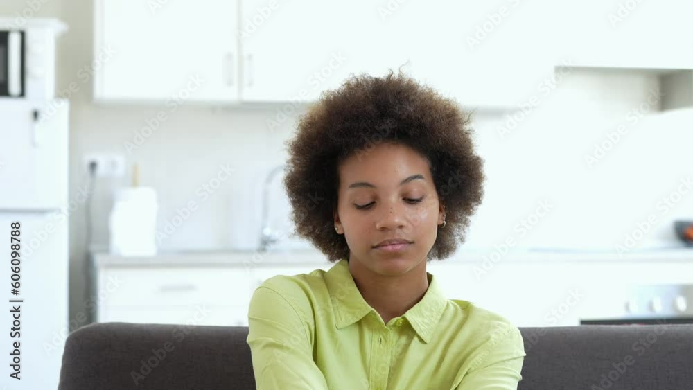 Pensive mixed race 20s woman sitting at home touch chin lost on deep thoughts thinking makes decision, side view face, challenge, problems solution, solving issues, consideration or brain work concept Pensive mixed race 20s woman sitting at home touch chin lost on deep thoughts thinking makes decision, side view face, challenge, problems solution, solving issues, consideration or brain work concept