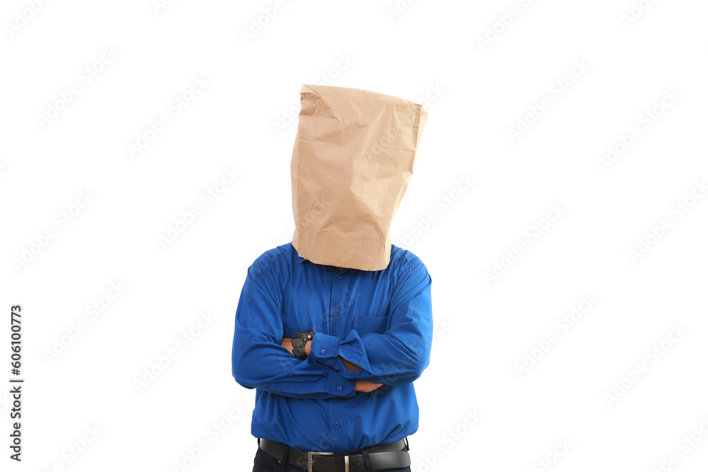 Businessman with a paper bag standing while folding hands