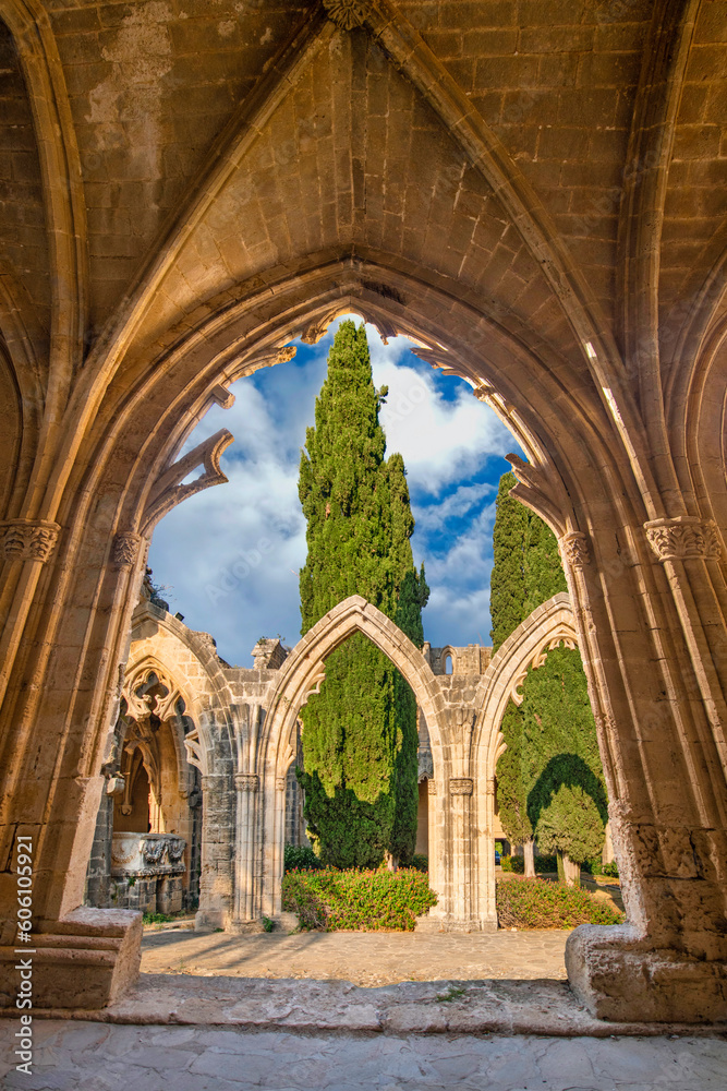 Bellapais Abbey, or "the Abbey of Peace" , is the ruin of a monastery built by Cannons Regular in the 13th century on the northern side of the small village of Bellapais, now in Northern Cyprus. - obrazy, fototapety, plakaty 