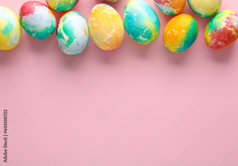 Multicolored Easter eggs on a pink background. Copy space Multicolored Easter eggs on a pink background. Copy space