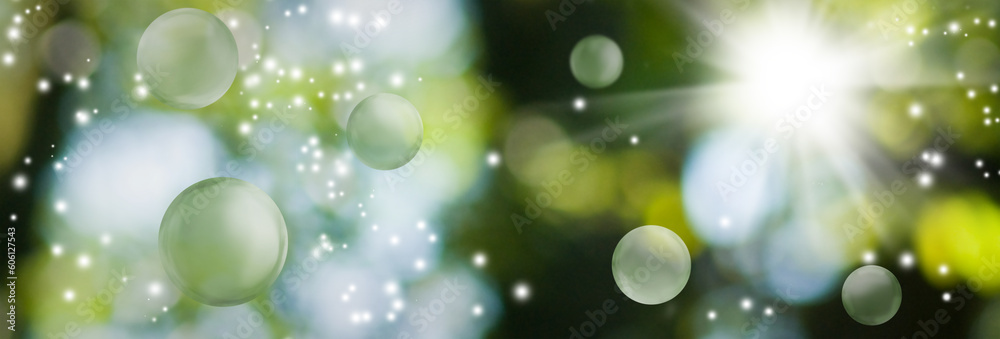 image of green blurred background with bokeh, bright flash of light and flying balls. Horizontal banner image of green blurred background with bokeh, bright flash of light and flying balls. Horizontal banner