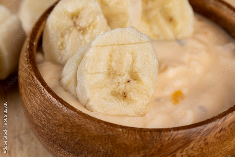 fresh banana-flavored yogurt with banana slices