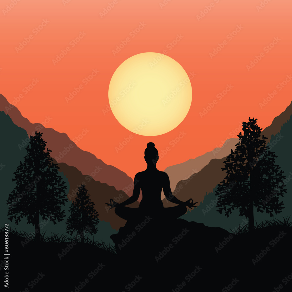 Silhouette of a woman meditating in the mountains at sunrise
