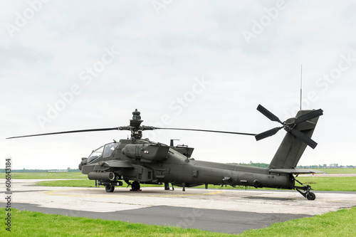 Tablou canvas AH 64 Apache at a field airfield